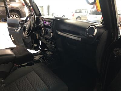 2011 Jeep Wrangler Sahara   - Photo 16 - Saint Louis, MI 48880-9800