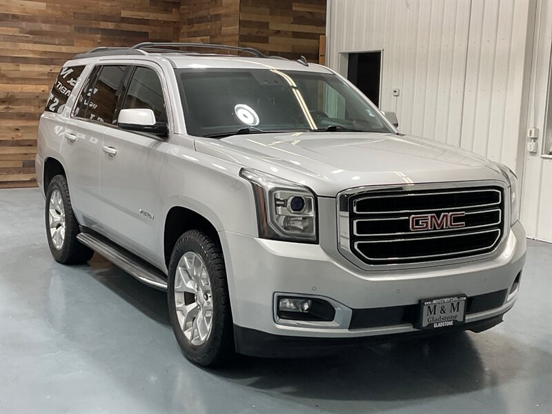 2015 GMC Yukon SLT 4X4 / 5.3L V8 / 1-OWNER / Leather / DVD  / Navigation & Backup Camera / Sunroof / Heated & Cooled Leather Seats / Rear DVD Player / 3RD ROW SEAT / 4-Captain Chairs / ZERO RUST - Photo 2 - Gladstone, OR 97027