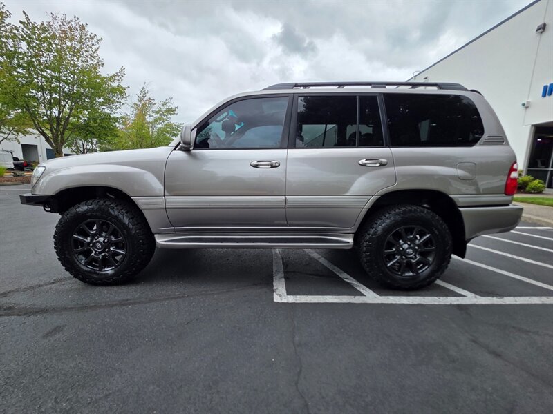 2004 Toyota Land Cruiser 4X4 DOBINSON LIFT / BF GOODRICH / TIMING BELT DONE / CUSTOM BUMPER / 8-PASSENGER / IMMACULATE SHAPE !! - Photo 4 - Portland, OR 97217