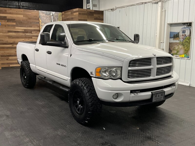 2004 Dodge Ram 2500 SLT Quad Cab 4X4 / 5.9L CUMMINS DIESEL / LIFTED  BRAND NEW LIFT w/ NEW WHEELS & TIRES / LEATHER / RUST FREE / SHARP & CLEAN!! - Photo 2 - Gladstone, OR 97027