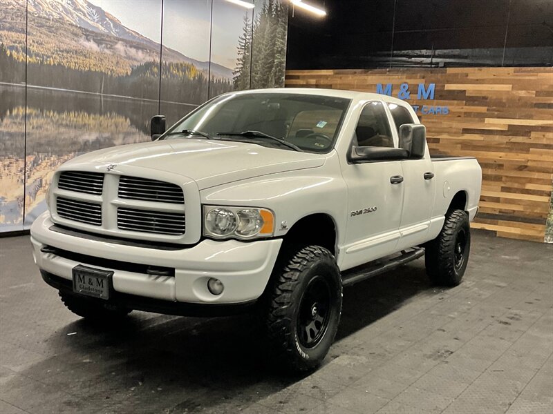 2004 Dodge Ram 2500 SLT Quad Cab 4X4 / 5.9L CUMMINS DIESEL / LIFTED  BRAND NEW LIFT w/ NEW WHEELS & TIRES / LEATHER / RUST FREE / SHARP & CLEAN!! - Photo 1 - Gladstone, OR 97027