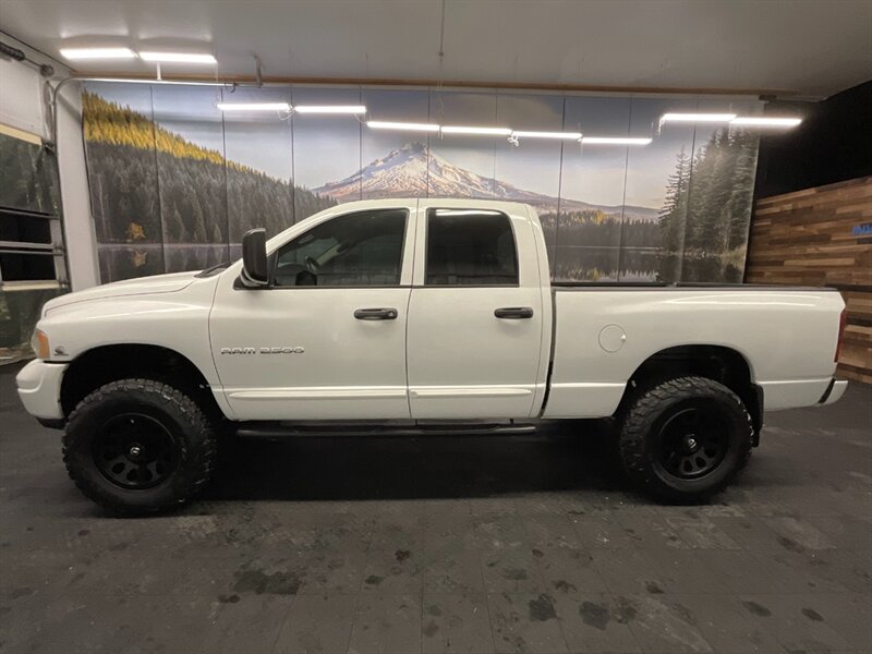 2004 Dodge Ram 2500 SLT Quad Cab 4X4 / 5.9L CUMMINS DIESEL / LIFTED  BRAND NEW LIFT w/ NEW WHEELS & TIRES / LEATHER / RUST FREE / SHARP & CLEAN!! - Photo 3 - Gladstone, OR 97027