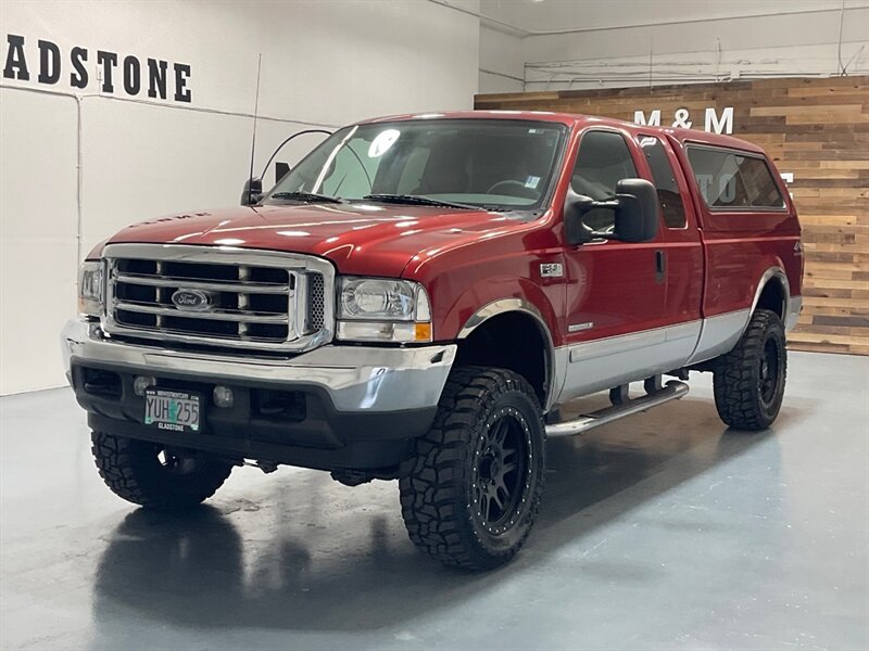 2002 Ford F-350 XLT 4X4 / 7.3L DIESEL / LIFTED /WHEELS / 35 " TIRES  / LONG BED / LOCAL TRUCK / ZERO RUST - Photo 1 - Gladstone, OR 97027