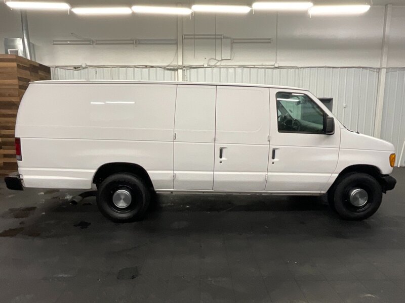 2003 Ford E-Series Van E-350 Super Duty EXTENDED CARGO VAN / 7.3L DIESEL  1-TON / 7.3L DIESEL / EXTENDED CARGO / BACKUP CAMERA / RUST FREE / CLEAN - Photo 4 - Gladstone, OR 97027