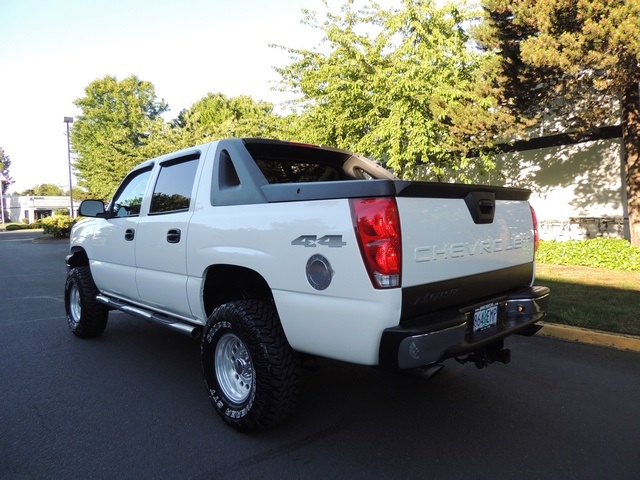 2004 chevy avalanche lifted white