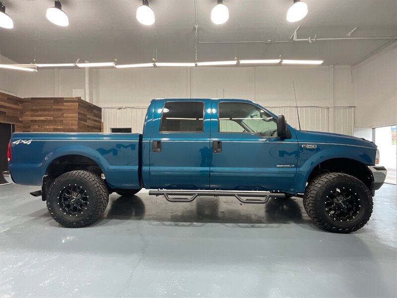 2001 Ford F-250 XLT 4X4 / 7.3L DIESEL / LIFTED /WHEELS / 35 " TIRES / LOW MILES / RUST FREE - Photo 4 - Gladstone, OR 97027