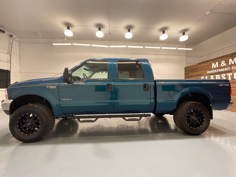 2001 Ford F-250 XLT 4X4 / 7.3L DIESEL / LIFTED /WHEELS / 35 " TIRES / LOW MILES / RUST FREE - Photo 3 - Gladstone, OR 97027
