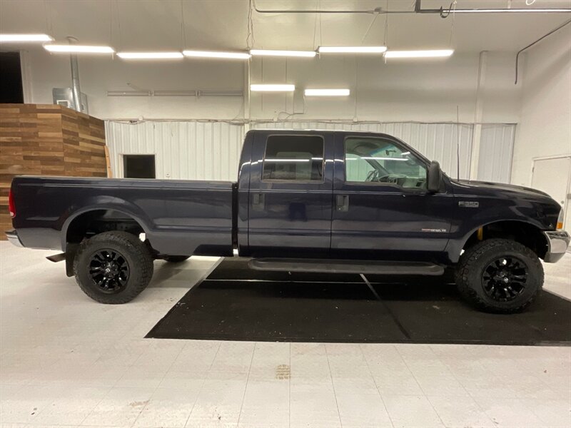 2000 Ford F-350 XLT 4X4 / 7.3L DIESEL / 6-SPEED / LIFTED  / LEVELED w. NEW WHEELS & TIRES / 153,000 MILES - Photo 4 - Gladstone, OR 97027