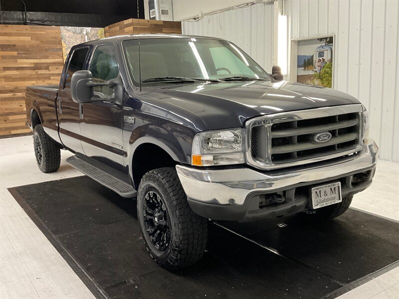 2000 Ford F-350 XLT 4X4 / 7.3L DIESEL / 6-SPEED / LIFTED  / LEVELED w. NEW WHEELS & TIRES / 153,000 MILES - Photo 2 - Gladstone, OR 97027