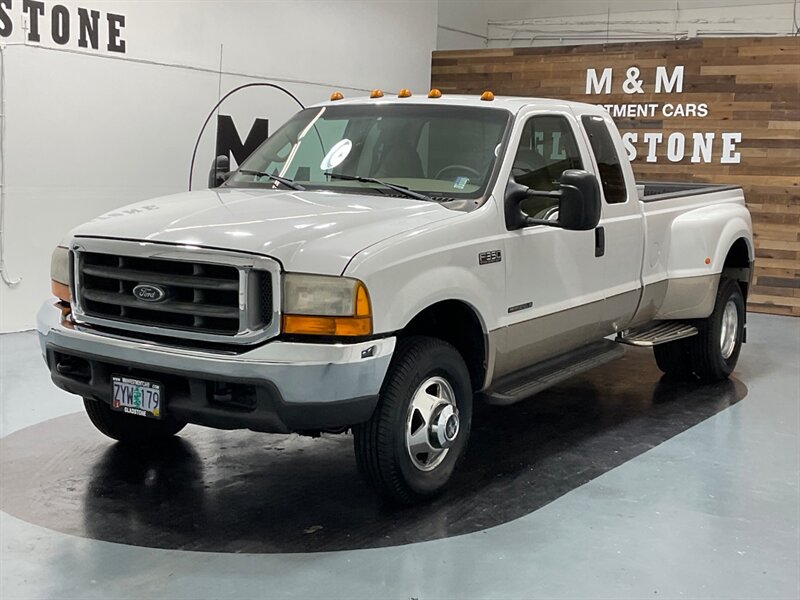 1999 Ford F-350 Lariat DUALLY 4X4 / 7.3L DIESEL / 6-SPEED MANUAL  / ZERO RUST / LOW MILES - Photo 1 - Gladstone, OR 97027