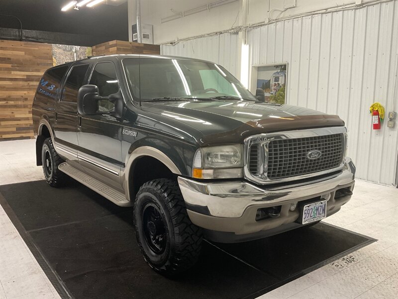 2002 Ford Excursion Limited 4WD / 7.3L DIESEL / LIFTED w. NEW TIRES  / LOCAL SUV / RUST FREE / LIFTED w. BRAND NEW 33 " MUD TIRES / Leather & Heated Seats / 3RD ROW SEAT - Photo 2 - Gladstone, OR 97027