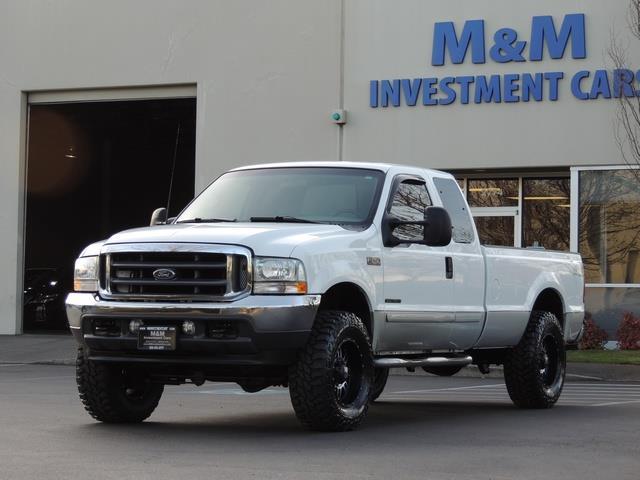 2002 Ford F-250 Super Duty XLT / 4X4 / 7.3L DIESEL / LIFTED   - Photo 40 - Portland, OR 97217