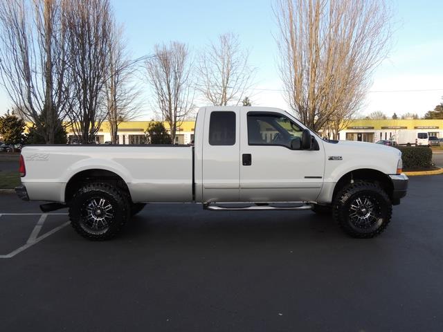 2002 Ford F-250 Super Duty XLT / 4X4 / 7.3L DIESEL / LIFTED   - Photo 4 - Portland, OR 97217