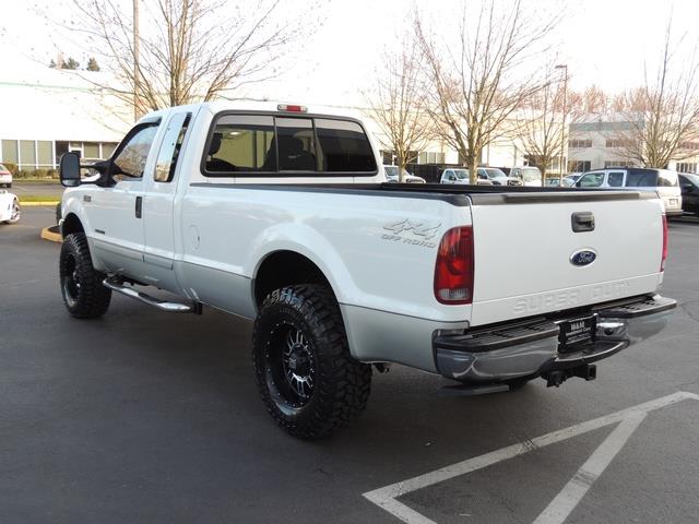 2002 Ford F-250 Super Duty XLT / 4X4 / 7.3L DIESEL / LIFTED   - Photo 7 - Portland, OR 97217