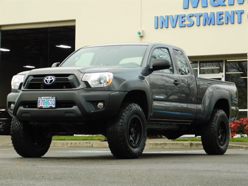 2014 Toyota Tacoma Access Cab 4X4 / 2.7L 4Cyl / 5-SPEED / LIFTED LIFT   - Photo 1 - Portland, OR 97217