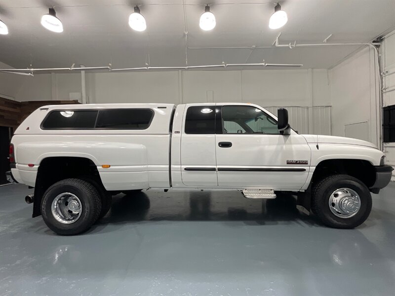 2002 Dodge Ram 3500 SLT Laramie DUALLY 4X4 / 5.9l DIESEL / 94K MILES  / DUALLY / LONG BED / /BRAND NEW SET OF TIRES / Jake Brake / Rear Airbags/ ZERO RUST - Photo 4 - Gladstone, OR 97027