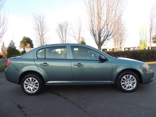 2009 Chevrolet Cobalt LS / 4-Door Sedan / Automatic / 4Cyl / Factory War   - Photo 4 - Portland, OR 97217