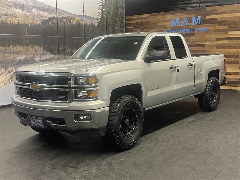 2014 Chevrolet Silverado 1500 LT Z71 4X4 / 5.3L V8 / LIFTED w/ NEW WHEELS & TIRE  Z71 OFF RD / Backup Cam / NEW 35 " A/T TIRES & AMERICAN RACING WHEELS - Photo 1 - Gladstone, OR 97027