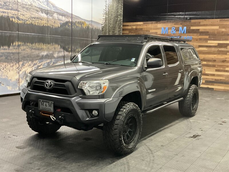 2014 Toyota Tacoma V6 4X4 / TRD OFF RD /LIFTED w/NEW WHEELS TIRES  LOCAL OREGON TRUCK / RUST FREE / NAVI & BACKUP CAMERA / RR DIFF LOCK / WINCH / SHARP  & CLEAN !! - Photo 1 - Gladstone, OR 97027