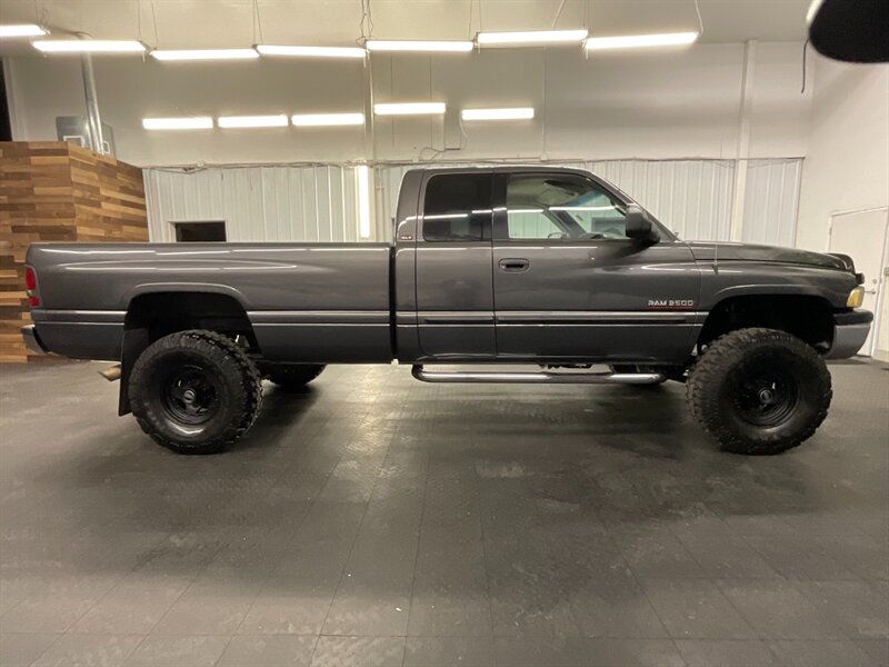 2002 Dodge Ram 2500 Laramie Quad Cab 4X4 / 5.9L CUMMINS DIESEL / LIFT  LIFTED w/ BRAND NEW WHEELS & TIRES / 1-OWNER / 120,000 MILES - Photo 4 - Gladstone, OR 97027