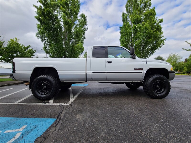 2001 Dodge Ram 2500 SLT  / 6-SPEED MANUAL / LONG BED / CUSTOM WHEELS + NEW TIRES / LIFTED - Photo 4 - Portland, OR 97217