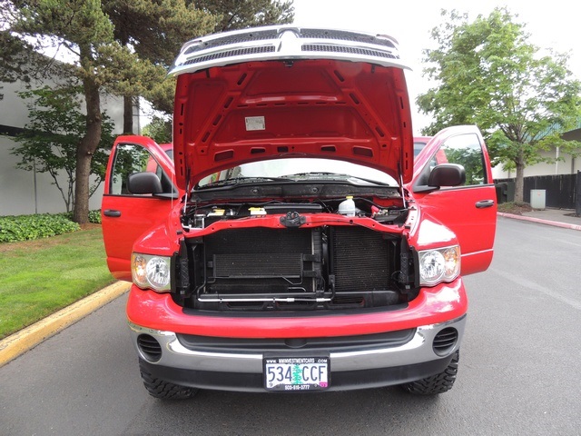 2005 Dodge Ram 1500 SLT/4x4/Quad Cab/ NEW 35inc MUD TIRES   - Photo 16 - Portland, OR 97217