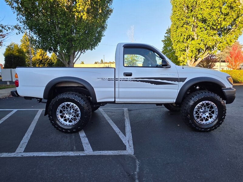 2001 Toyota Tacoma SINGLE CAB 4-CYL 2.7L / 4X4 / 5-SPEED / 1-OWNER / MANUAL TRANSMISSION / 165K MILES / NEW LIFT + WHEELS + TIRES / IMMACULATE - Photo 4 - Portland, OR 97217
