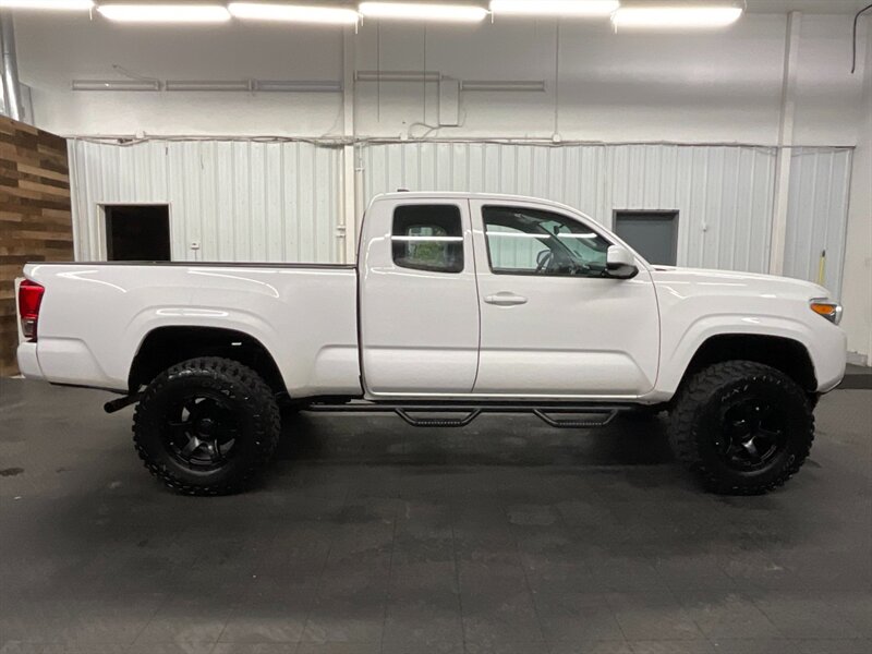 2016 Toyota Tacoma Access Cab  4X4 / 5-SPEED /NEW LIFT / 33,000 MILE  NEW 33 " MUD TIRES & 17 " BLACK WHEELS / - Photo 4 - Gladstone, OR 97027