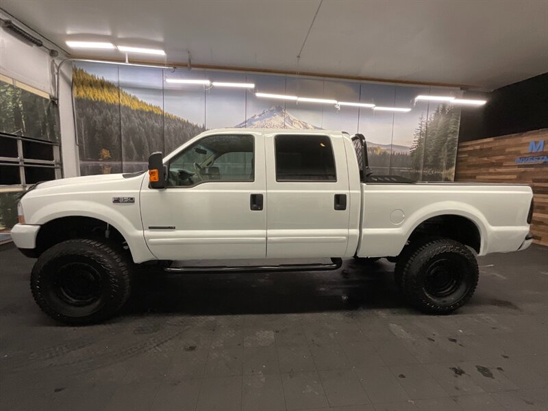 2001 Ford F-350 Lariat Crew Cab 4X4 / 7.3L DIESEL / 6-SPEED MANUAL  BRAND NEW 4 " LIFT KIT w/ BRAND NEW WHEELS & TIRES / 6-SPEED / RUST FREE / ONLY 115,000 MILES / SHARP & CLEAN - Photo 3 - Gladstone, OR 97027