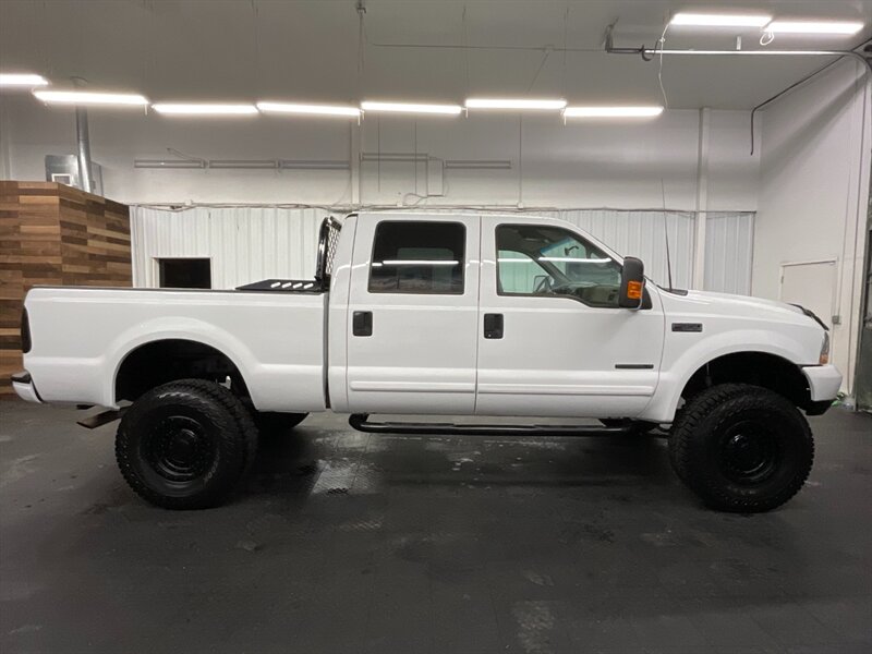 2001 Ford F-350 Lariat Crew Cab 4X4 / 7.3L DIESEL / 6-SPEED MANUAL  BRAND NEW 4 " LIFT KIT w/ BRAND NEW WHEELS & TIRES / 6-SPEED / RUST FREE / ONLY 115,000 MILES / SHARP & CLEAN - Photo 4 - Gladstone, OR 97027