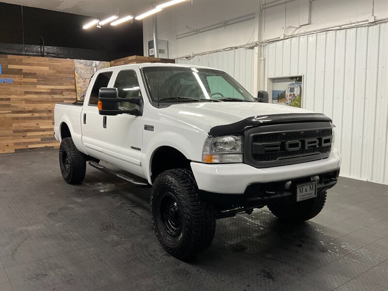 2001 Ford F-350 Lariat Crew Cab 4X4 / 7.3L DIESEL / 6-SPEED MANUAL  BRAND NEW 4 " LIFT KIT w/ BRAND NEW WHEELS & TIRES / 6-SPEED / RUST FREE / ONLY 115,000 MILES / SHARP & CLEAN - Photo 2 - Gladstone, OR 97027