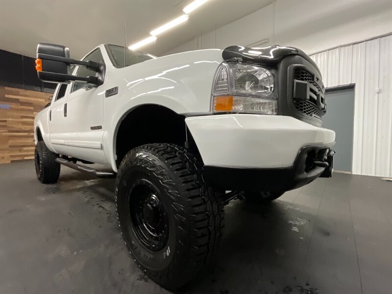 2001 Ford F-350 Lariat Crew Cab 4X4 / 7.3L DIESEL / 6-SPEED MANUAL  BRAND NEW 4 " LIFT KIT w/ BRAND NEW WHEELS & TIRES / 6-SPEED / RUST FREE / ONLY 115,000 MILES / SHARP & CLEAN - Photo 10 - Gladstone, OR 97027