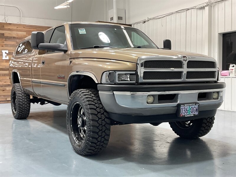 2001 Dodge Ram 2500 SLT Laramie Quad Cab 4X4 /5.9L DIESEL / 5-SPEED / LONG BED / LEVELED W. BRAND NEW WHEELS & TIRES / ZERO RUST / Rear airbags / ONLY 111K MILES - Photo 39 - Gladstone, OR 97027