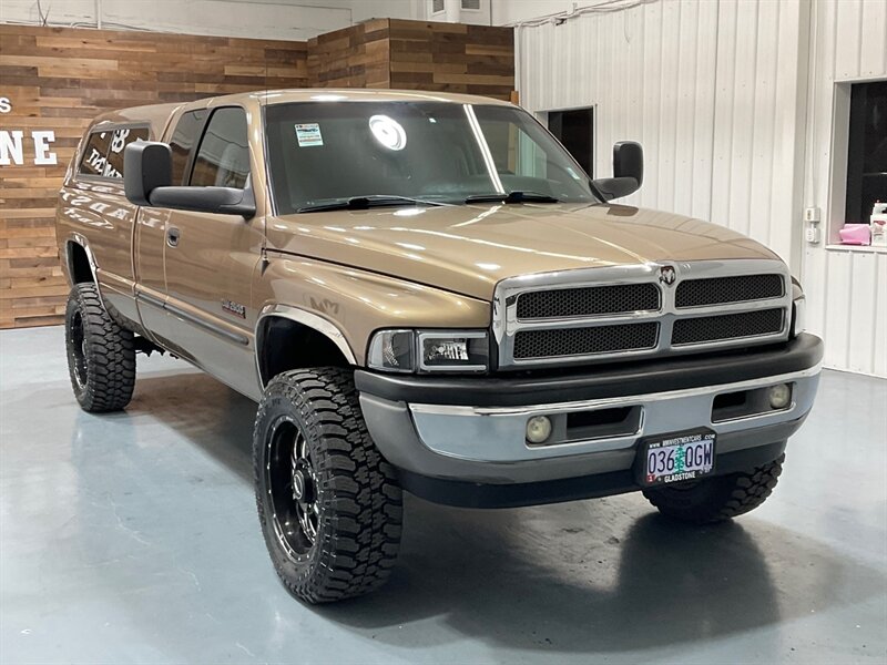 2001 Dodge Ram 2500 SLT Laramie Quad Cab 4X4 /5.9L DIESEL / 5-SPEED / LONG BED / LEVELED W. BRAND NEW WHEELS & TIRES / ZERO RUST / Rear airbags / ONLY 111K MILES - Photo 2 - Gladstone, OR 97027