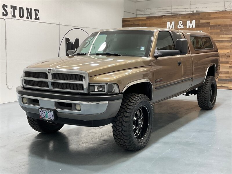 2001 Dodge Ram 2500 SLT Laramie Quad Cab 4X4 /5.9L DIESEL / 5-SPEED / LONG BED / LEVELED W. BRAND NEW WHEELS & TIRES / ZERO RUST / Rear airbags / ONLY 111K MILES - Photo 1 - Gladstone, OR 97027
