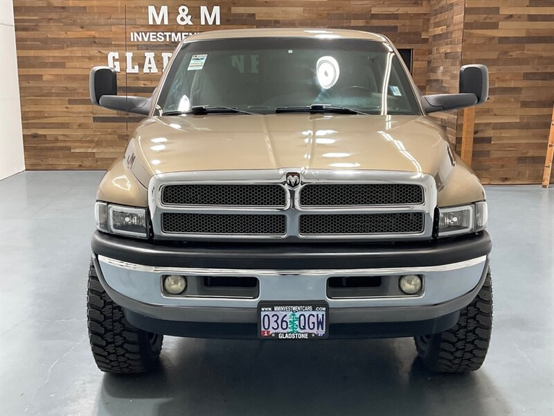 2001 Dodge Ram 2500 SLT Laramie Quad Cab 4X4 /5.9L DIESEL / 5-SPEED / LONG BED / LEVELED W. BRAND NEW WHEELS & TIRES / ZERO RUST / Rear airbags / ONLY 111K MILES - Photo 5 - Gladstone, OR 97027
