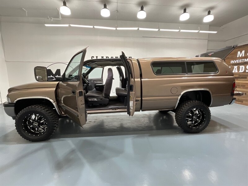 2001 Dodge Ram 2500 SLT Laramie Quad Cab 4X4 /5.9L DIESEL / 5-SPEED / LONG BED / LEVELED W. BRAND NEW WHEELS & TIRES / ZERO RUST / Rear airbags / ONLY 111K MILES - Photo 10 - Gladstone, OR 97027