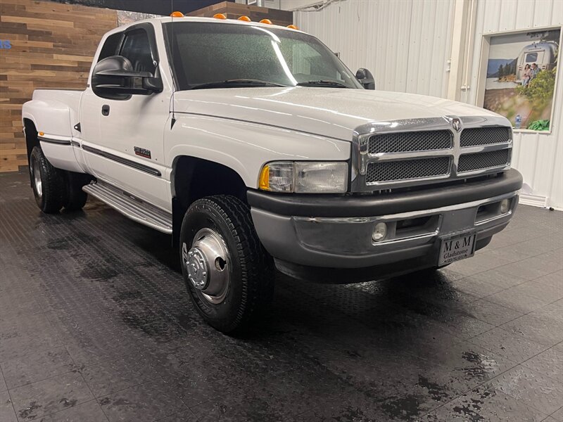 1999 Dodge Ram 3500 Laramie SLT 4X4 / 5.9L CUMMINS DIESEL / DUALLY  BRAND NEW TIRES / LEATHER / DUALLY / 135,000 MILES / RUST FREE - Photo 2 - Gladstone, OR 97027