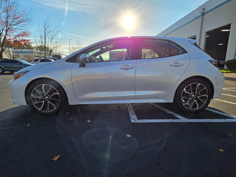 2022 Toyota Corolla Hatchback XSE  Heated Leather / NAVi / Dynamic Cruise / LANE WARNING / New Tires  / BSM / Very Low Miles - Photo 3 - Portland, OR 97217