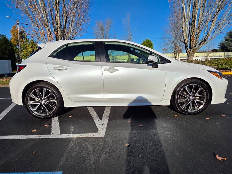 2022 Toyota Corolla Hatchback XSE  Heated Leather / NAVi / Dynamic Cruise / LANE WARNING / New Tires  / BSM / Very Low Miles - Photo 4 - Portland, OR 97217
