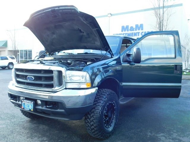 2002 Ford F-250 Super Duty XLT / 4X4 / V10 / Crew Cab / LIFTED   - Photo 25 - Portland, OR 97217