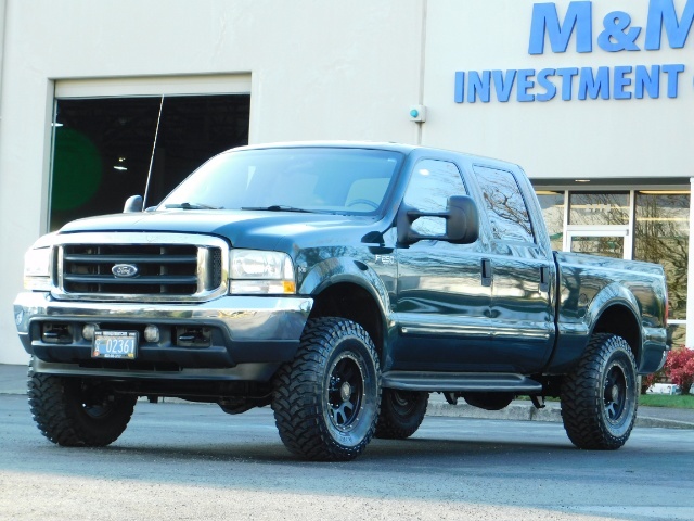 2002 Ford F-250 Super Duty XLT / 4X4 / V10 / Crew Cab / LIFTED   - Photo 40 - Portland, OR 97217