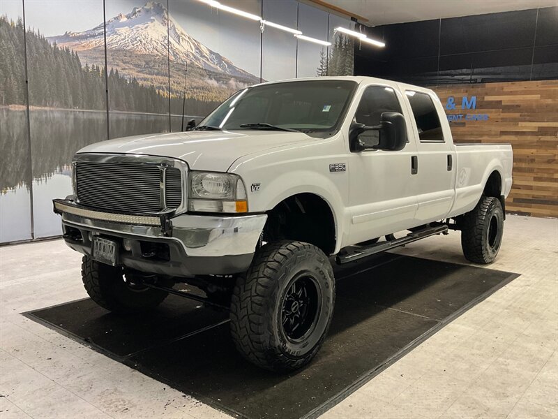 2001 Ford F-350 XLT Crew Cab 4X4 / 6.8L V10 / LIFTED w. 37 " TIRES  / RUST FREE / LONG BED / Navigation / LIFTED w. 37 " MUD TIRES & 17 " BLACK WHEELS - Photo 1 - Gladstone, OR 97027