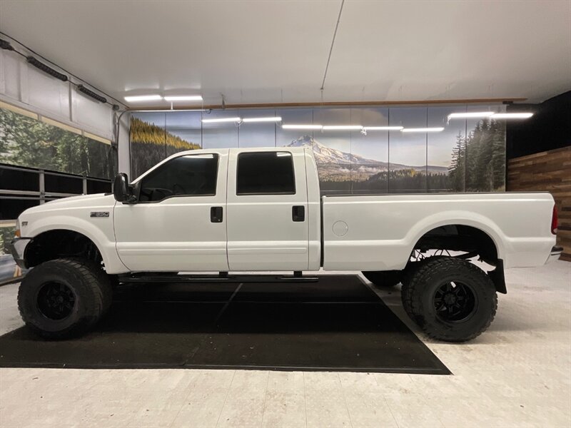 2001 Ford F-350 XLT Crew Cab 4X4 / 6.8L V10 / LIFTED w. 37 " TIRES  / RUST FREE / LONG BED / Navigation / LIFTED w. 37 " MUD TIRES & 17 " BLACK WHEELS - Photo 3 - Gladstone, OR 97027