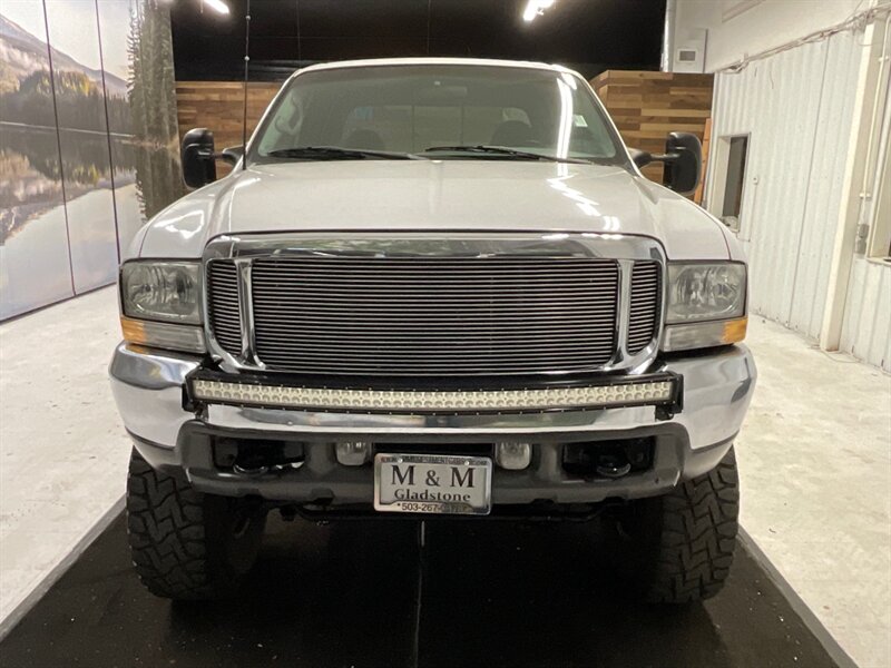 2001 Ford F-350 XLT Crew Cab 4X4 / 6.8L V10 / LIFTED w. 37 " TIRES  / RUST FREE / LONG BED / Navigation / LIFTED w. 37 " MUD TIRES & 17 " BLACK WHEELS - Photo 5 - Gladstone, OR 97027