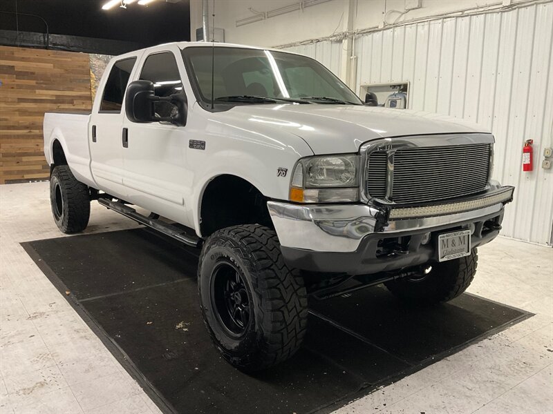 2001 Ford F-350 XLT Crew Cab 4X4 / 6.8L V10 / LIFTED w. 37 " TIRES  / RUST FREE / LONG BED / Navigation / LIFTED w. 37 " MUD TIRES & 17 " BLACK WHEELS - Photo 2 - Gladstone, OR 97027