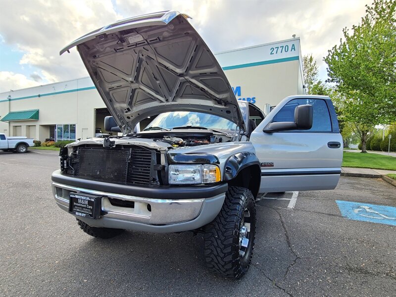 1999 Dodge Ram 2500 LONG BED 4X4 / 5.9L DIESEL / LIFTED / MANUAL  / Laramie / Leather / TOYO Mud Tires / CUMMINS / LOCAL / NO RUST / New Clutch - Photo 25 - Portland, OR 97217