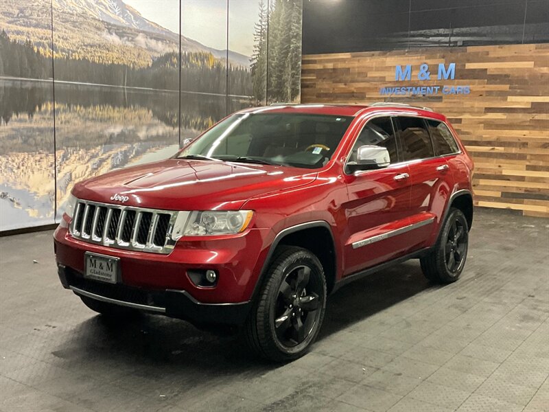 2012 Jeep Grand Cherokee Overland Sport Utility 4X4 / 5.7L V8 HEMI/ LOADED  Navigation & Backup Camera / Leather & Heated Seats / Sunroof / BRAND NEW TIRES - Photo 1 - Gladstone, OR 97027