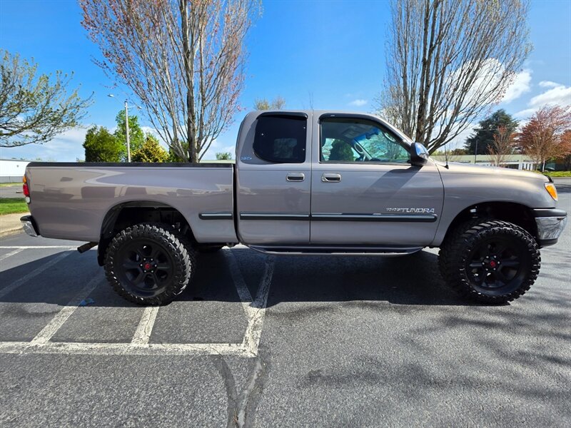 2000 Toyota Tundra SR5 V8 4X4 / TIMING BELT + WATER PUMP /LIFT KIT / MUD TIRES / SPC CONTROL ARMS / LEATHER / 160K MILES - Photo 4 - Portland, OR 97217