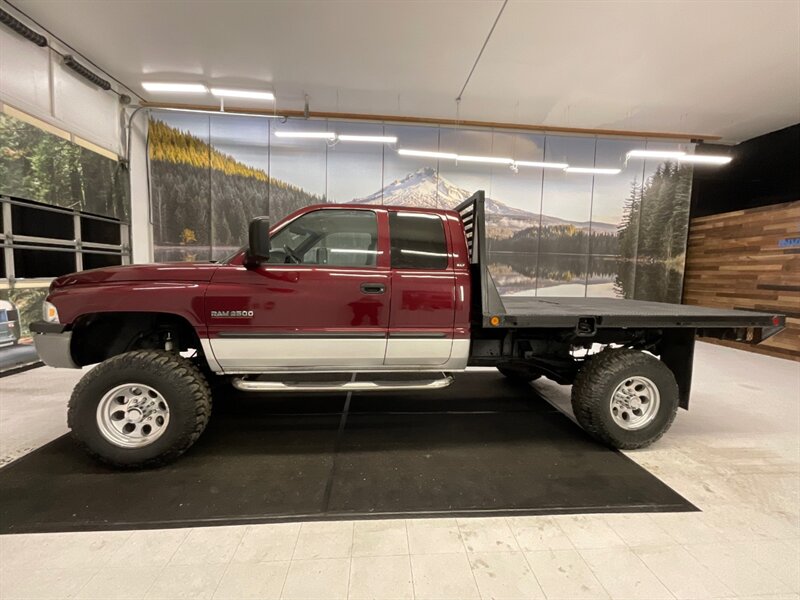 2002 Dodge Ram 2500 4dr SLT 4X4/5.9L DIESEL/6-SPEED/ LIFTED /FLAT BED  /LIFTED w. BRAND NEW 35 " MUD TIRES / 6-SPEED MANUAL  & EXHAUST BRAKE / LOCAL TRUCK / RUST FREE / 161,000 MILES - Photo 3 - Gladstone, OR 97027